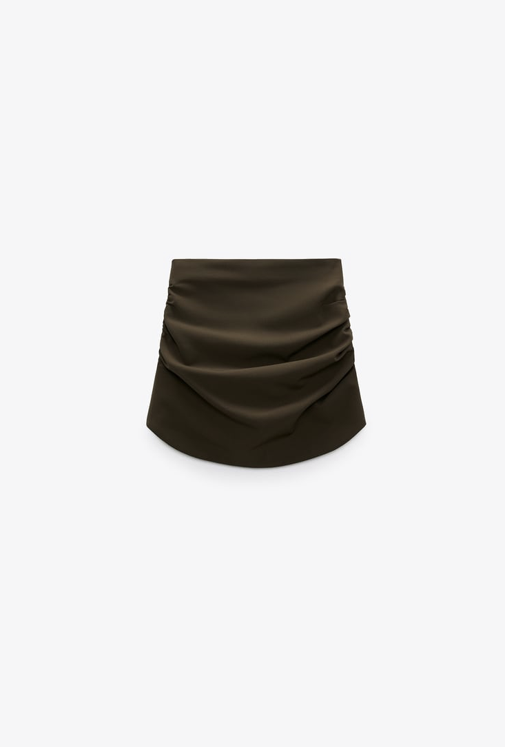 https://flyfiercefab.com/wp-content/uploads/2021/09/Zara-Green-Pleated-Skirt.png