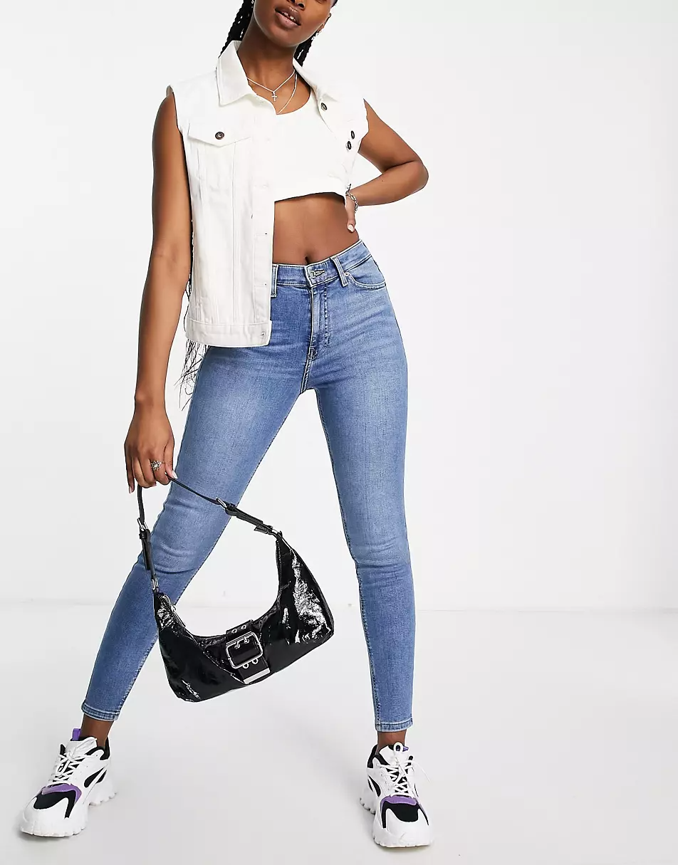 https://flyfiercefab.com/wp-content/uploads/2022/04/ASOS-Topshop-Jamie-recycled-cotton-blend-jeans-in-mid-blue.png