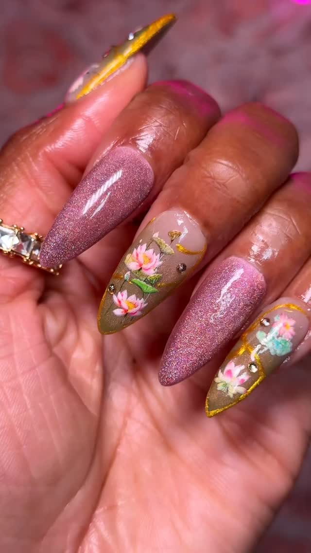 Need some spring nail inspo you can do at home? 👀 I got you! Here’s how I did these pink and green lotus flower spring nails 💅🏾 🪷✨. Comment “SHOP” and I’ll DM you the link to everything I used to make these press on nails 💌 https://liketk.it/64NfD

Products Used: 
💅🏾 @apresnailofficial Long Natural Almond Gel X Nails
💅🏾 @beetlesgelpolish Base Gel
💅🏾 @dndgel Sunset Suede
💅🏾 Born Pretty Guava Cat Eye Gel Polish
💅🏾 @shein_us Lotus Flower Nail Stickers
💅🏾 Gold Metallic Paint Gel Polish
💅🏾 Gold Nail Rhinestones
💅🏾 Beetles Light Pink Gel Polish
💅🏾 Double Rhythm Pink Rainbow Cat Eye Gel Polish
💅🏾 @btartboxnails Builder Gel
💅🏾 @gaoy_official_ Top Coat
💅🏾 @sallybeauty Beauty Secrets Drip & Clog Proof Nail Glue
 —
#flyfiercefab #getpressedbabe #pressonnails #ltkbeauty #nailsathome how to make press on nails, spring nails 2026, spring nails tutorial, how to do nails at home, gel nails at home, how to do hombre nails, how to use nail stickers, how to use cat eye gel, polish, Rhode Island influencer, Boston influencer, black style influencer, pink nails, green nails, lotus flower nails
